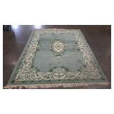 Area rug, 70" x 104", needs cleaned