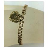 14k bracelet 8.3 grams tested gold 7in heart