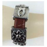 Leather and silvertone slide charm bracelet and