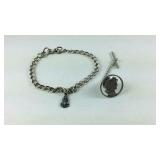Barber dime tie tack and a silvertone bracelet
