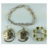 Peridot heart brooch, seahorse earrings, and a