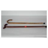 2 walking canes. Each measures 34" long.