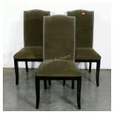 Three dining chairs in green velveteen upholstery