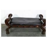 Bench with carved detail and leather-look seat,