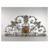 Metal scroll wall hanging with porcelain