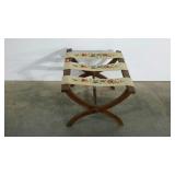 Luggage stand, needlework detail, folds for