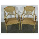 Pair of ornate arm chairs with claw foot detail,