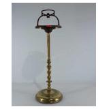 Brass toned metal smoking stand with glass