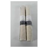 Two unopened rubber bath mats