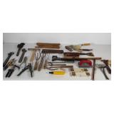 Group of tools, wrenches, stapler, tool handles,