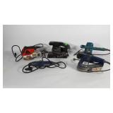 Group of power sanding tools, all work per