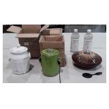 4 Ceramic Napafire Lites. 2 bottles of fuel, 4