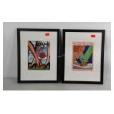 Pair of Vogue framed prints, frames in rough