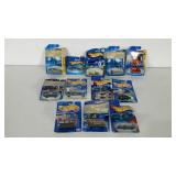 Group of 12 Hot Wheels cars in package, cards