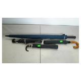 4 Umbrellas - 1 is Raymond James brand