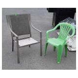 Metal patio chair and green plastic lawn chair