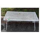 White wrought iron patio table