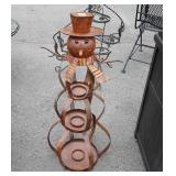 Metal decor snowman, he does hold candles is