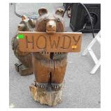 Wood carved bear holding a howdy sign 34" tall