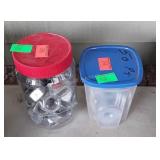 Two small containers of bolts and washers