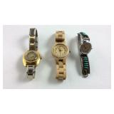 Three wrist watches
