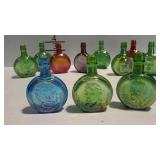 11 miniature Wheaton bottles