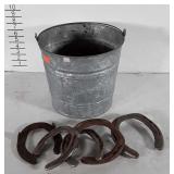 Galvanized Bucket of used Horse Shoes