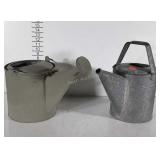 Two galvanized Watering Cans, one painted with