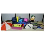 Sporting goods lot. Tennis rackets and balls,
