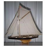 Sailboat on stand, in lovely condition with lots