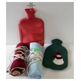 2 Heating pads, and 2 hot water bottles