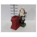 Cast iron coin bank, Santa at chimney, repro