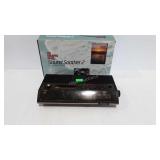 AM / FM radio alarm clock with box, powers up