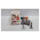 Sewing patterns and assorted scissors in poly shoe
