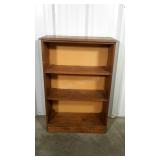 Small pine bookcase. A few dings, see pics.