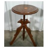 Three legged stand with bird carvings and