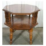 Single octagonal end table with undershelf.