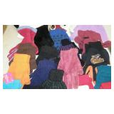 Group of winter gloves and hats.