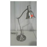 Chrome finish desk lamp. Adjustable.
