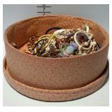 Fabric-covered storage box filled with costume