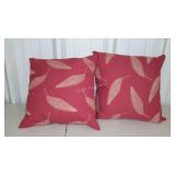 Pair of throw pillows. Red with beige feather