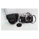 Vintage Yashica Electra 35 camera with cover.