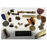 Military pins, pocket knife, and medals