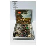 Hunting scenes tin filled with costume jewelry