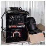 Hobart Stickmate LX welder. With helmet, hammer,