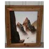 Framed and signed painting on canvas. Mountain