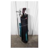 Golf bag with some Clubs