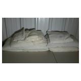 Group: four bed pillows, one lightweight fleece