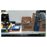 Two boxes of office supplies to include an HP