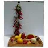 Wooden serving tray with artificial fruit and